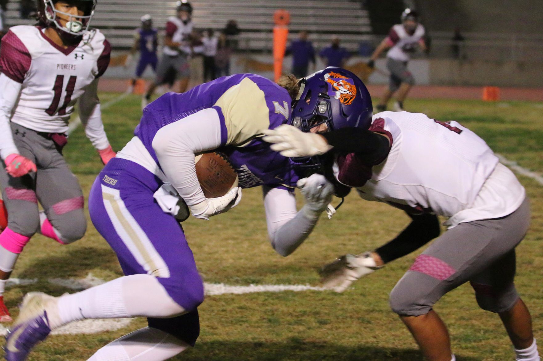 Tigers stay hot with 42-6 rout of Pioneers, clinch playoff spot